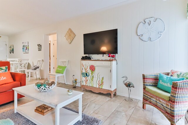 living room featuring wooden walls