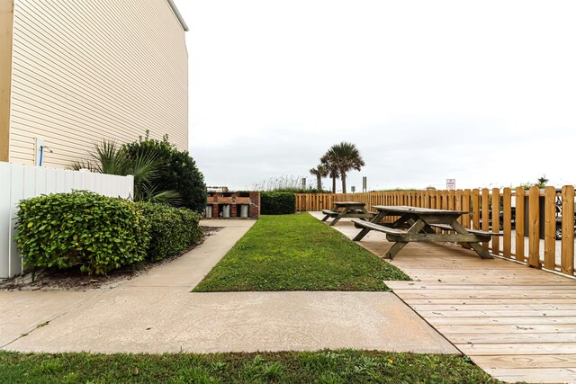 view of yard featuring a wooden deck