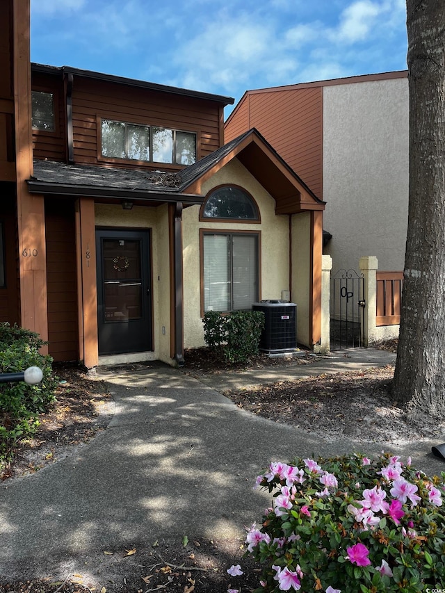 view of front of house featuring central AC unit