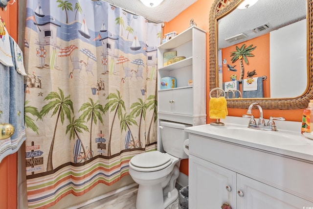 full bathroom featuring hardwood / wood-style floors, vanity, shower / bath combination with curtain, toilet, and a textured ceiling