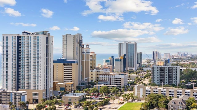 property's view of city with a water view