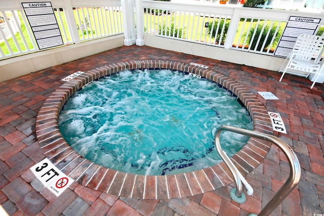 view of pool featuring an indoor in ground hot tub