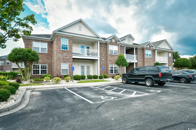 2013 Silvercrest Dr Unit 30-H, Myrtle Beach, SC 29579 - view of front of home with brick siding and uncovered parking