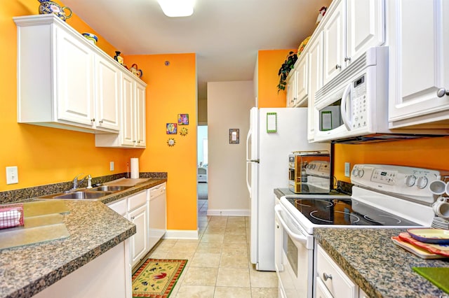 2013 Silvercrest Dr Unit 30-H, Myrtle Beach, SC 29579 - kitchen featuring white appliances, a sink, and white cabinetry