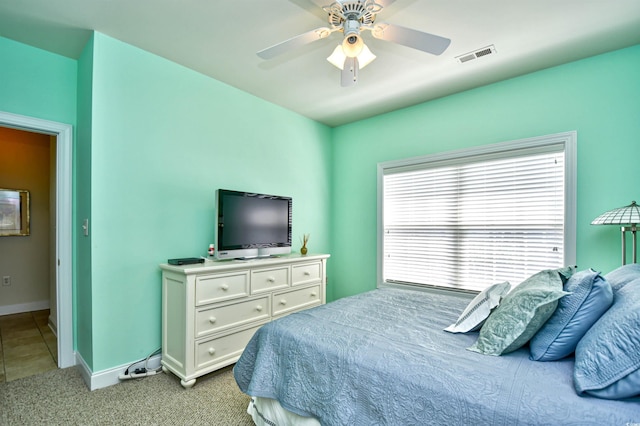 2013 Silvercrest Dr Unit 30-H, Myrtle Beach, SC 29579 - bedroom with baseboards, light colored carpet, and ceiling fan