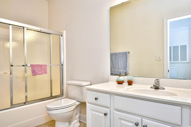 2013 Silvercrest Dr Unit 30-H, Myrtle Beach, SC 29579 - bathroom featuring vanity, toilet, combined bath / shower with glass door, and tile patterned floors