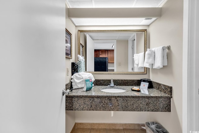 bathroom featuring sink and tile patterned floors