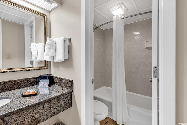 bathroom featuring shower / bath combo, toilet, and tile patterned floors