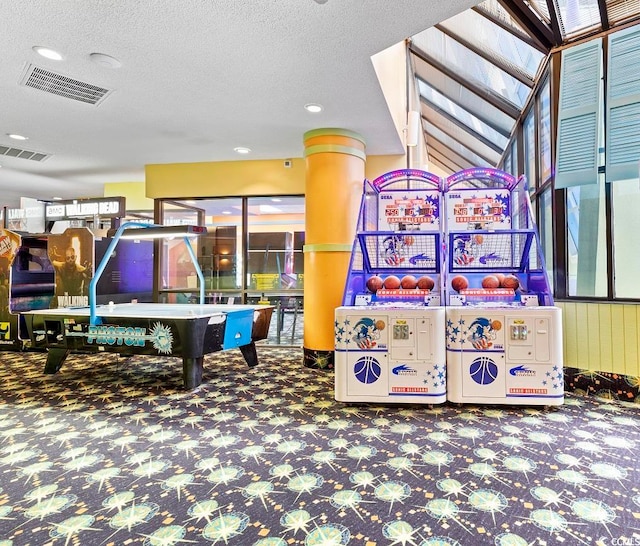 playroom with vaulted ceiling, a textured ceiling, and carpet flooring