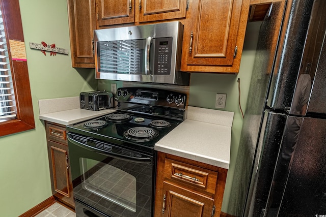 kitchen with black appliances