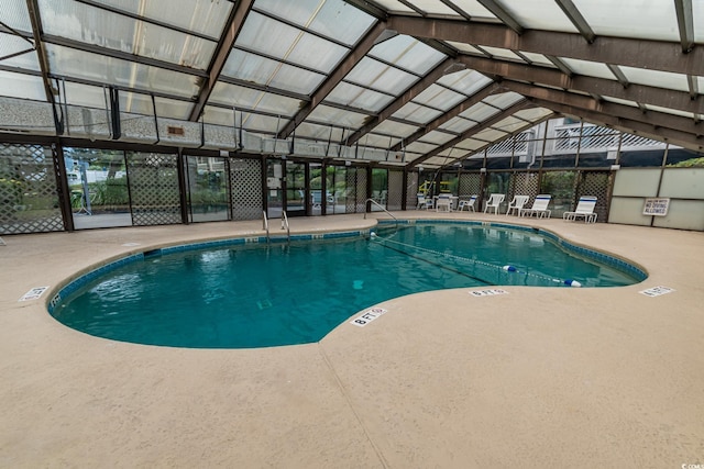 view of swimming pool featuring a patio area