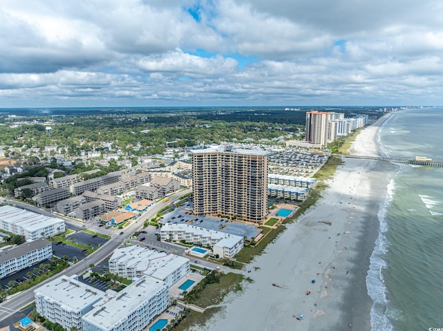 bird's eye view with a view of the beach and a water view