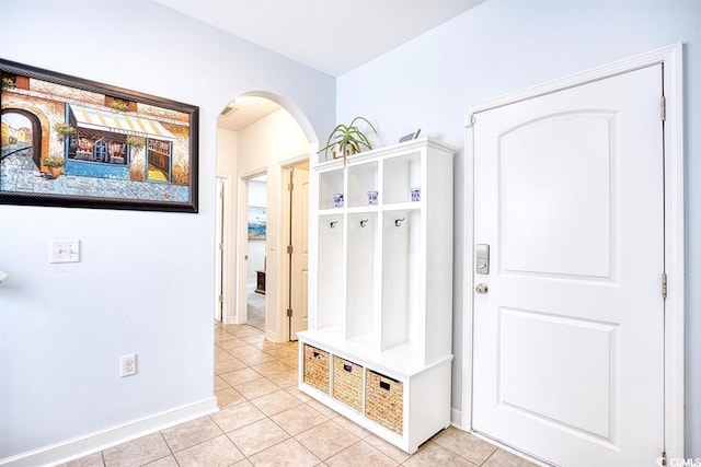 mudroom with light tile patterned floors