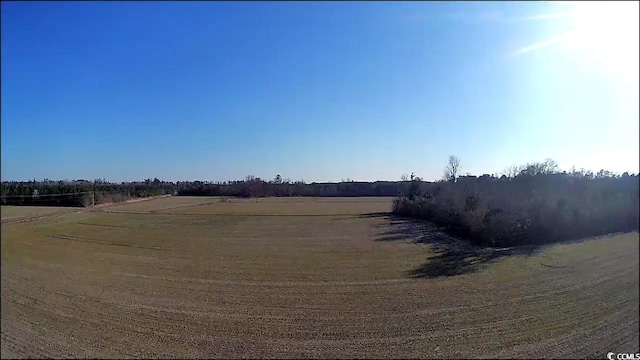 view of yard featuring a rural view