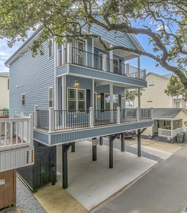 back of property with a balcony