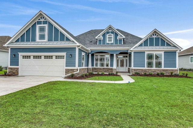 1104 Maccoa Dr, Conway, SC 29526 - craftsman house with a front yard, a standing seam roof, stone siding, and driveway