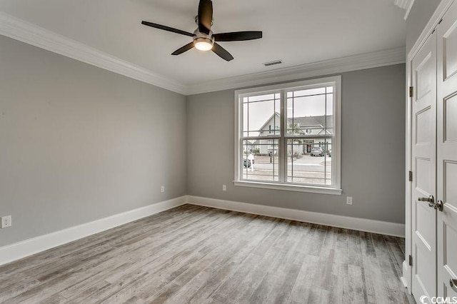 1104 Maccoa Dr, Conway, SC 29526 - interior space featuring wood finished floors, visible vents, ceiling fan, crown molding, and baseboards