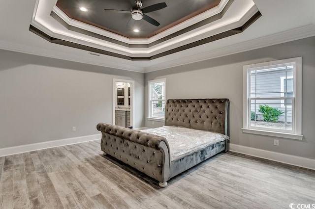 bedroom with ceiling fan, hardwood / wood-style flooring, and crown molding