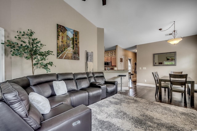 living room with dark hardwood / wood-style floors