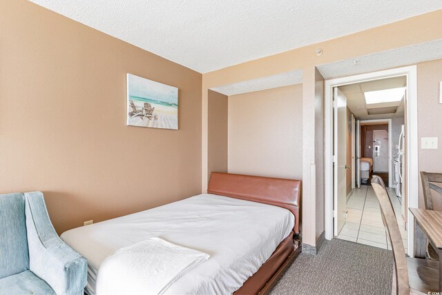 bedroom with tile patterned floors