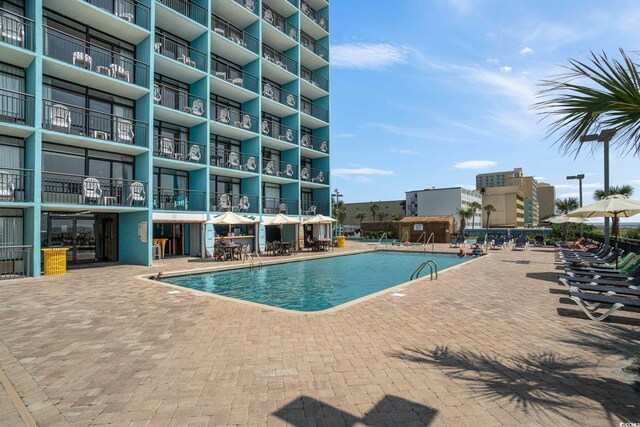 view of pool with a patio