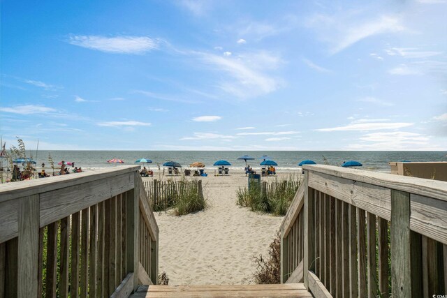 property view of water featuring a view of the beach