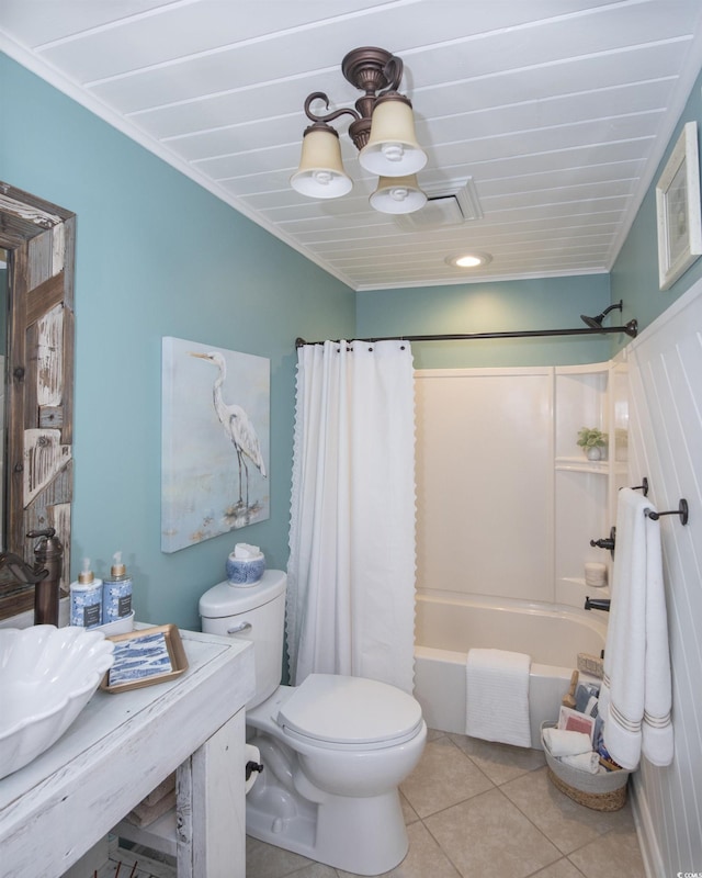 full bathroom with sink, shower / bath combination with curtain, ornamental molding, toilet, and tile patterned floors