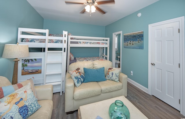 bedroom featuring dark hardwood / wood-style floors and ceiling fan