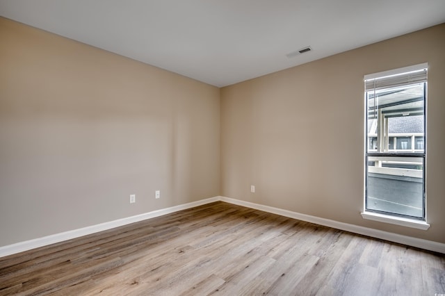 empty room featuring light hardwood / wood-style floors