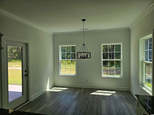 unfurnished dining area with a healthy amount of sunlight, crown molding, and dark wood-type flooring