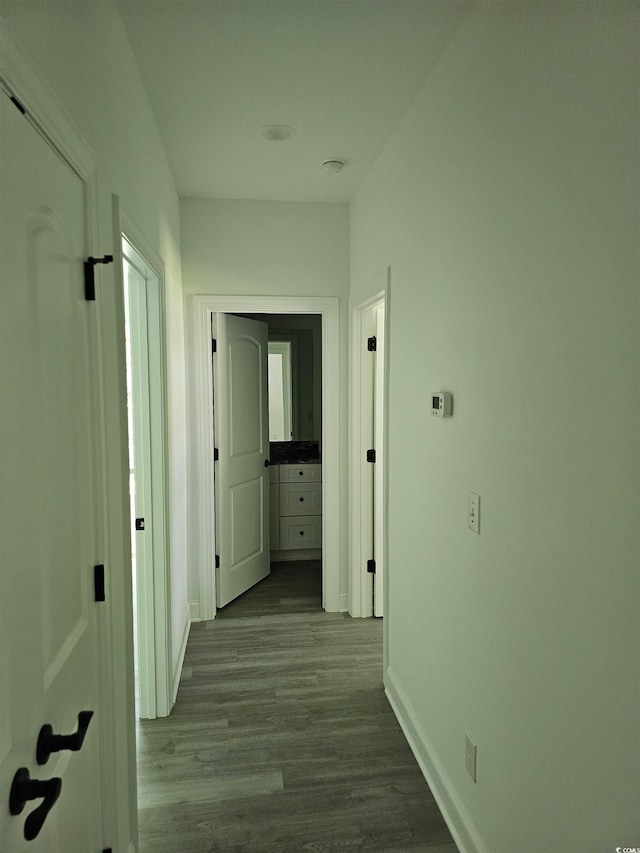 hallway featuring light wood-type flooring