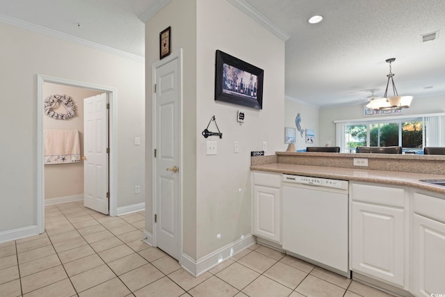 1100 Commons Blvd Unit 104, Myrtle Beach, SC 29572 - kitchen with white dishwasher, crown molding, light tile patterned floors, white cabinetry, and light countertops