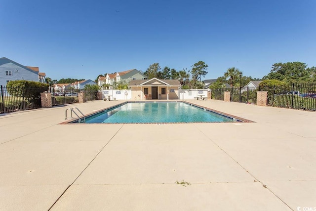 3681 Claypond Rd Unit 3107, Myrtle Beach, SC 29579 - community pool featuring a patio area and a residential view