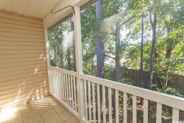 unfurnished sunroom with wooden ceiling