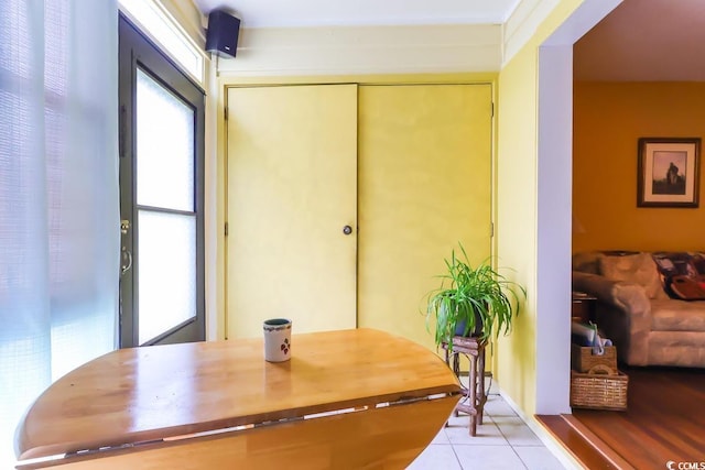 interior space featuring light tile patterned floors