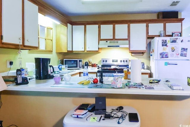 kitchen with white cabinetry and stainless steel appliances