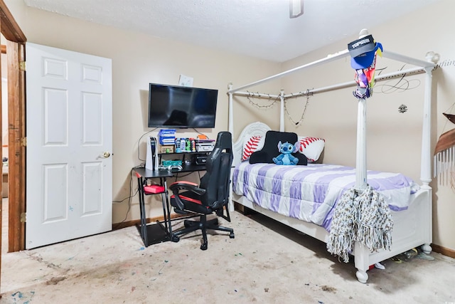 bedroom with ceiling fan and concrete floors