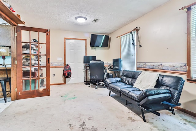 interior space with a textured ceiling