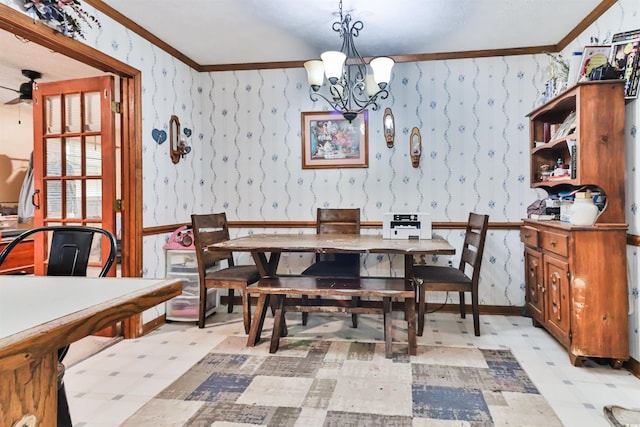 dining space with crown molding and ceiling fan with notable chandelier