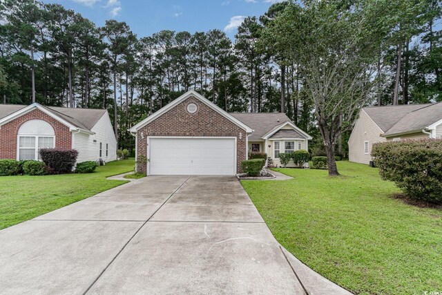 ranch-style home with a front yard and a garage