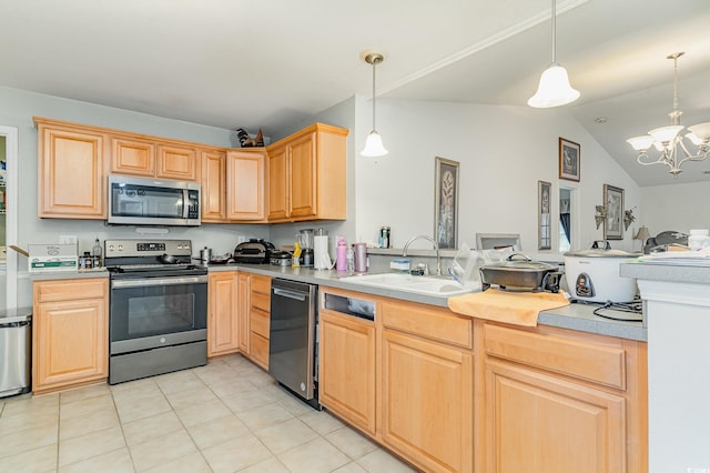 kitchen featuring appliances with stainless steel finishes, sink, pendant lighting, and light brown cabinetry