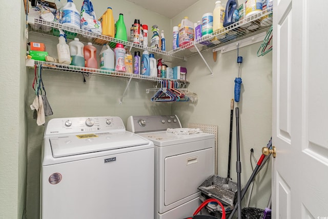 washroom with separate washer and dryer