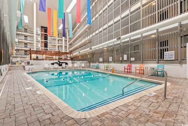 5905 S Kings Hwy Unit 416-B, Myrtle Beach, SC 29575 - indoor pool featuring a patio area