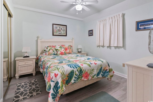 5905 S Kings Hwy Unit 416-B, Myrtle Beach, SC 29575 - bedroom featuring dark wood-type flooring and a ceiling fan
