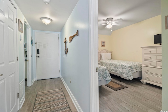 interior space featuring ceiling fan and light wood-type flooring