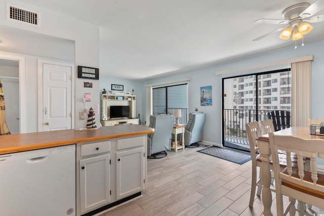 5905 S Kings Hwy Unit 416-B, Myrtle Beach, SC 29575 - kitchen with white dishwasher, light wood finished floors, white cabinets, a ceiling fan, and open floor plan