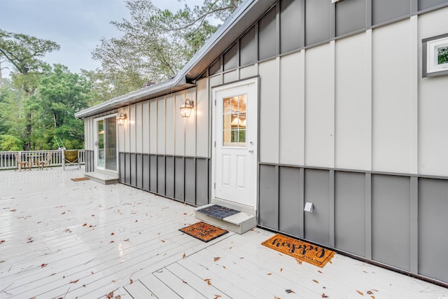 doorway to property featuring a deck