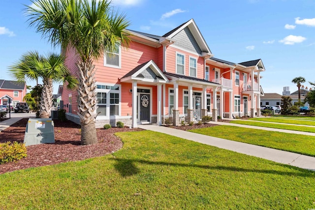 craftsman-style house with a front yard