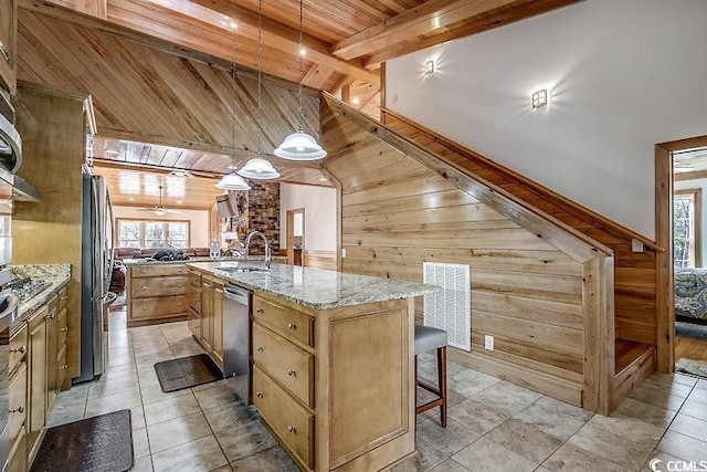 kitchen with hanging light fixtures, sink, stainless steel fridge, wooden ceiling, and a spacious island