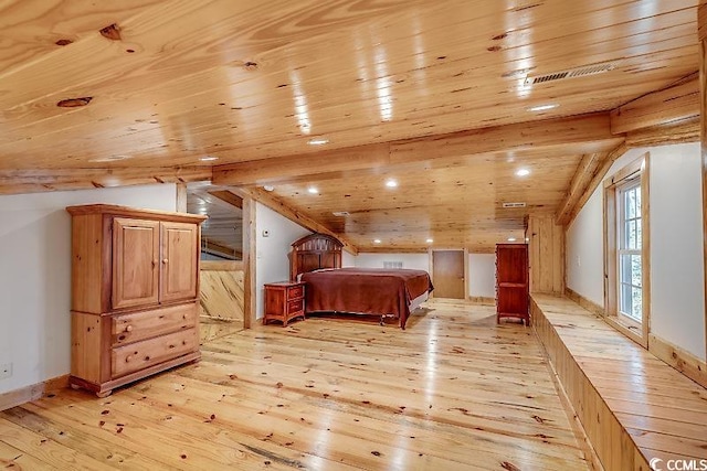 unfurnished bedroom with vaulted ceiling, light wood-type flooring, and wood ceiling